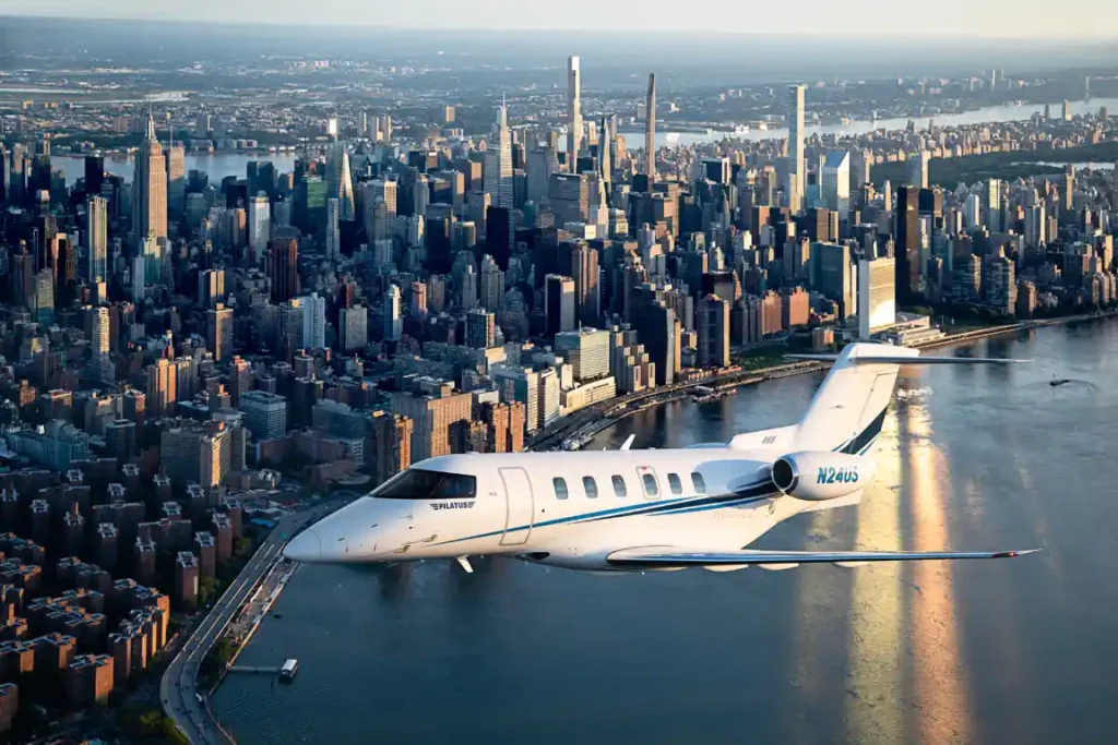 PC-24 Skyline Calendar flying over new york city