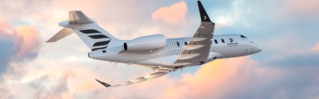 stunning private jet flying in front of clouds