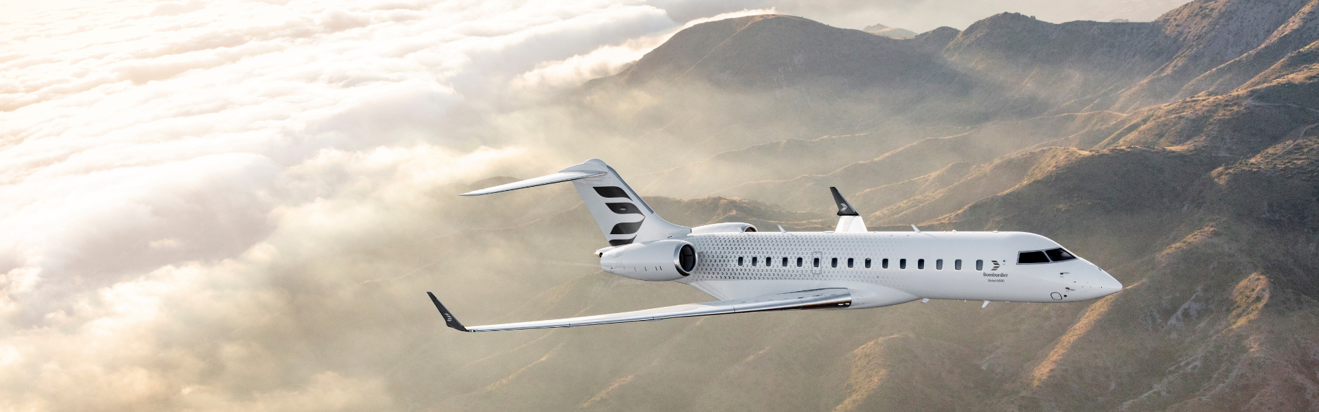 luxury private jet Inflight above mountains