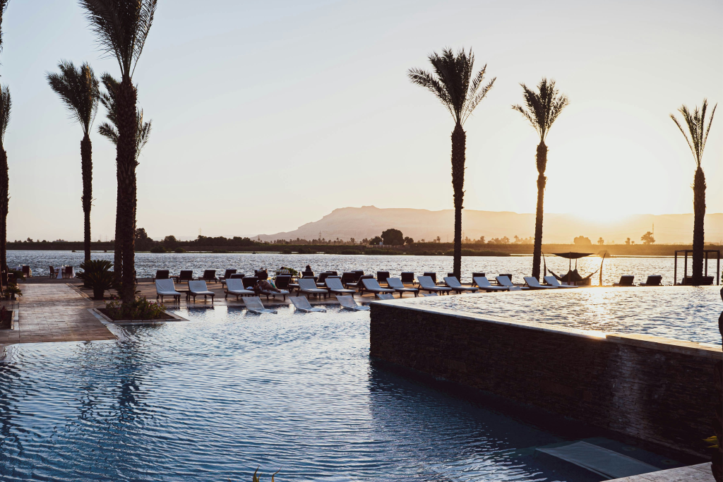 The pool and patio overlooking the Nile river in Luxor, Egypt.
