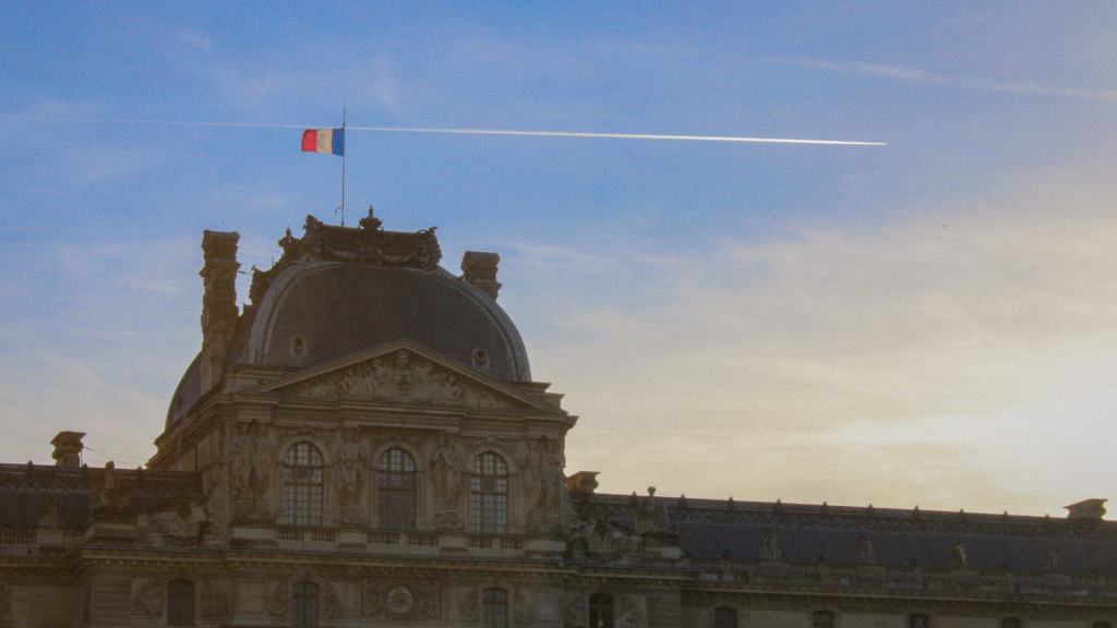 Private jet flying across paris