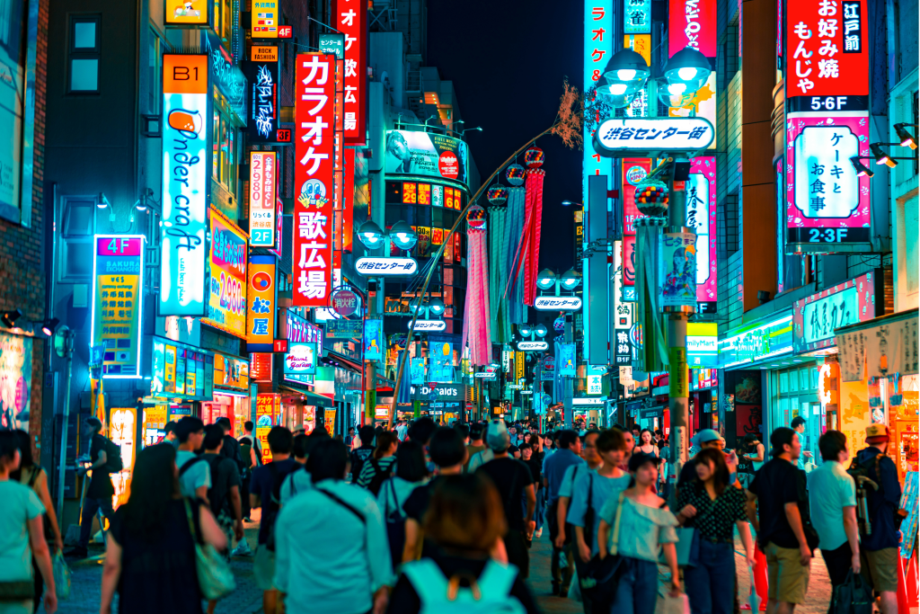 busy night time shopping in Shibuya in tokyo