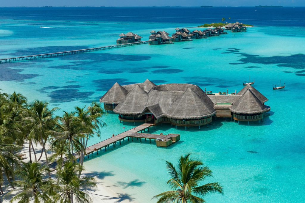 luxury villas over the blue water in the maldives
