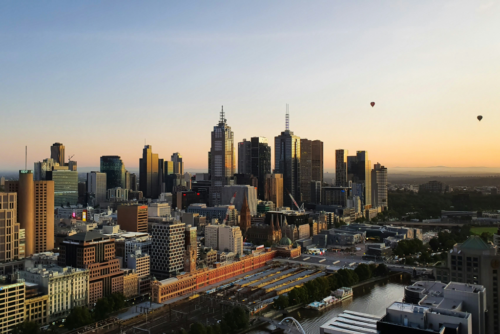 Skyline with sunrise and balloons, Melbourne, Australia