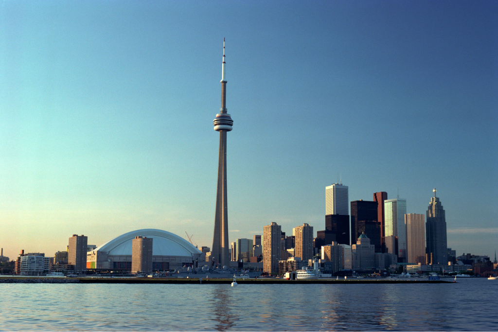 canada's torontos skyline and water at dusk