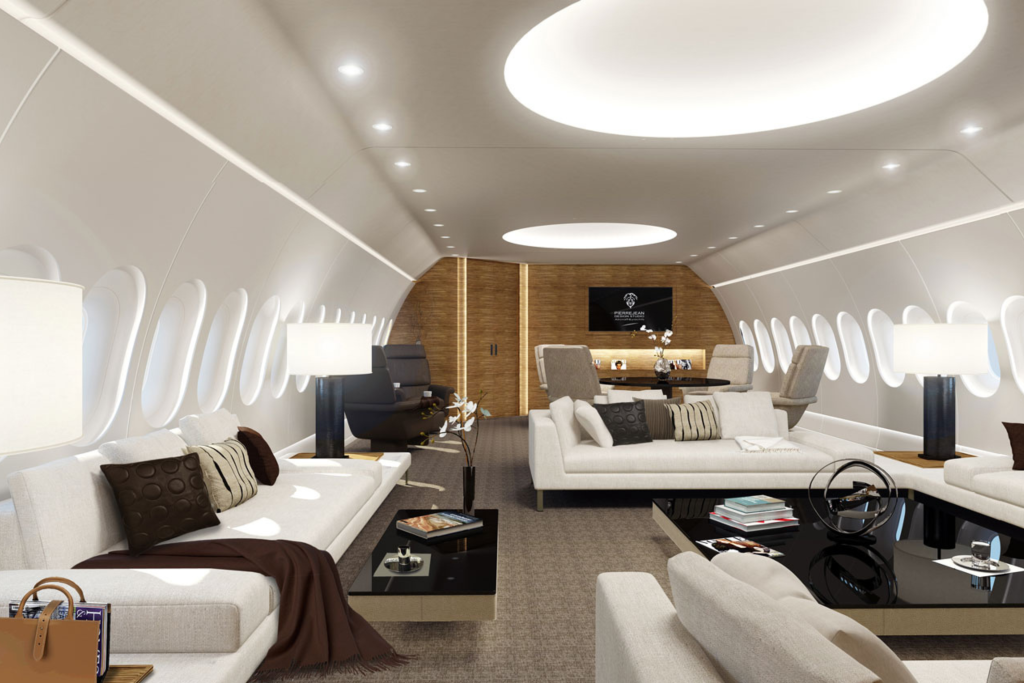 large, luxurious jet interior with luxury bag